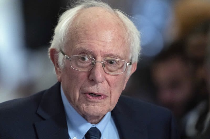 FILE – Sen. Bernie Sanders, I-Vt., talks to the media as he walks to the House chamber before President Joe Biden’s State of the Union address at the U.S. Capitol Thursday, March 7, 2024, in Washington. Police in Vermont are seeking a suspect who allegedly started a fire Friday, April 5, 2024, outside the office of U.S. Sen. Bernie Sanders. The small blaze caused minor damage but no injuries. (AP Photo/Jose Luis Magana, File)