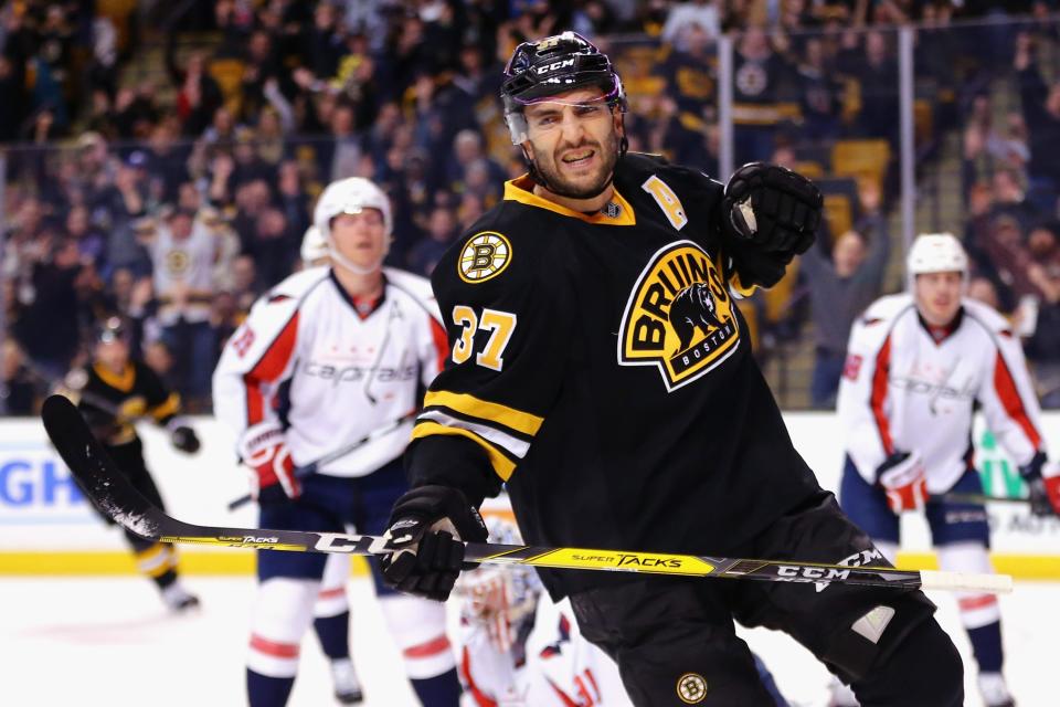 BOSTON, MA - MARCH 05:  Patrice Bergeron #37 of the Boston Bruins celebrates after scoring against the Washington Capitals during the first period at TD Garden on March 5, 2016 in Boston, Massachusetts.  (Photo by Maddie Meyer/Getty Images)