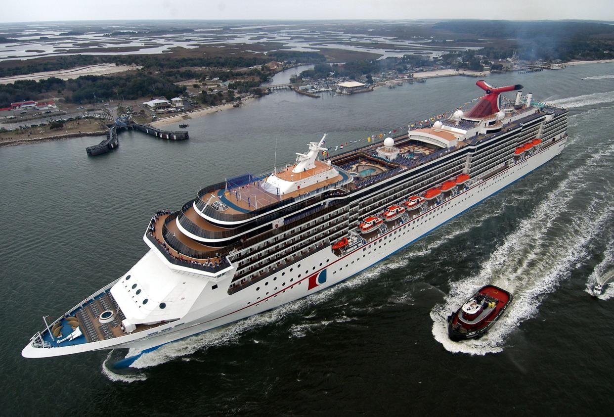 Carnival Miracle sails up the St. John's River after a trans-Atlantic voyage from its Finnish shipyard on Feb. 23, 2004, in Jacksonville, Florida.