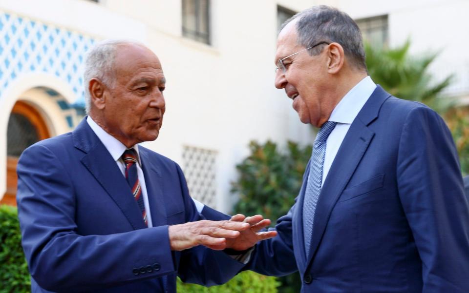Russian foreign minister Sergey Lavrov, right, listens to Secretary General of the Arab League Secretary General Ahmed Aboul Gheit during their meeting in Cairo, Egypt, on Sunday - Russian Foreign Ministry Press Service via AP