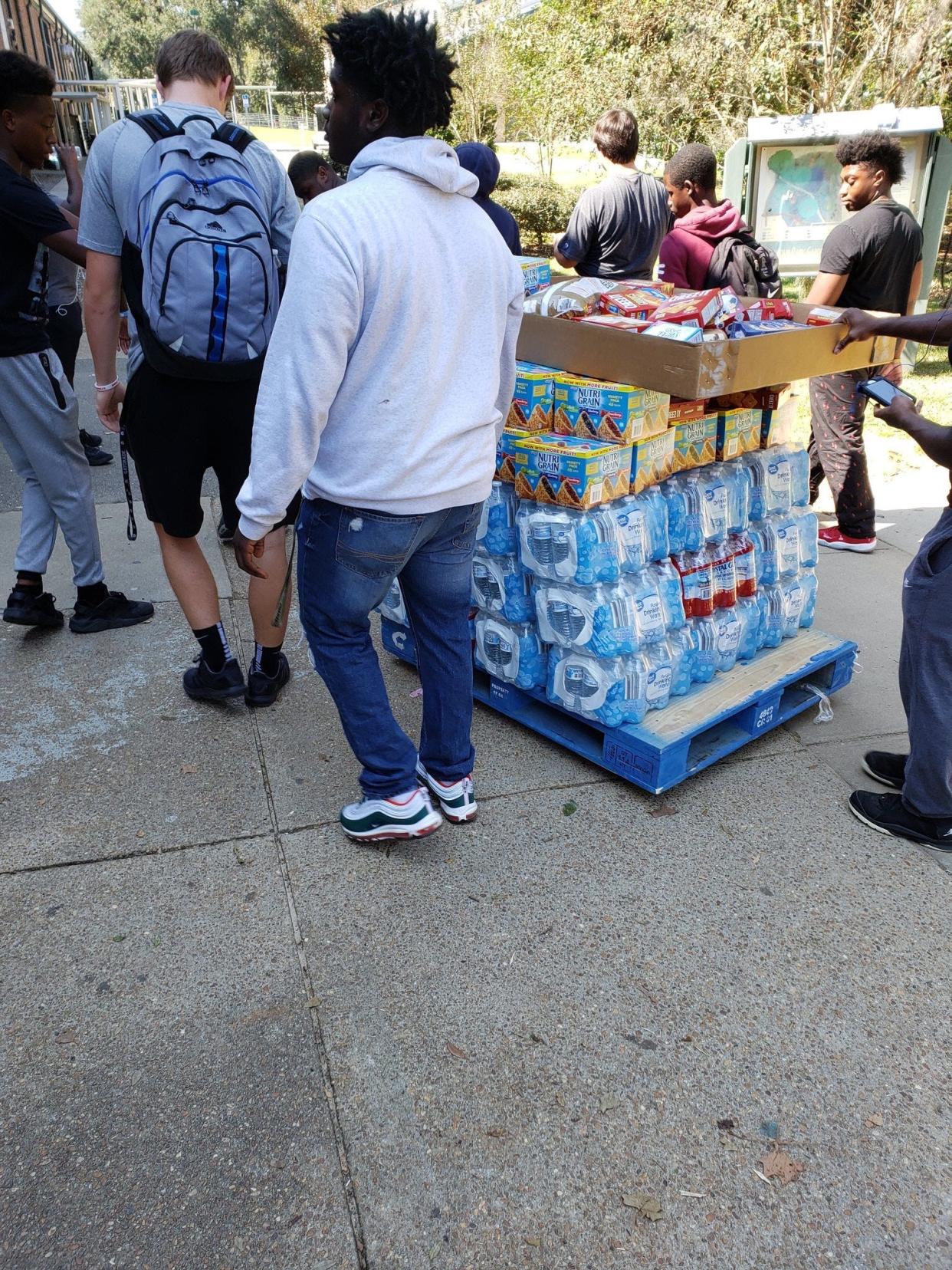 Lincoln football players helped deliver supplies to Blountstown after it was hit by Hurricane Michael.