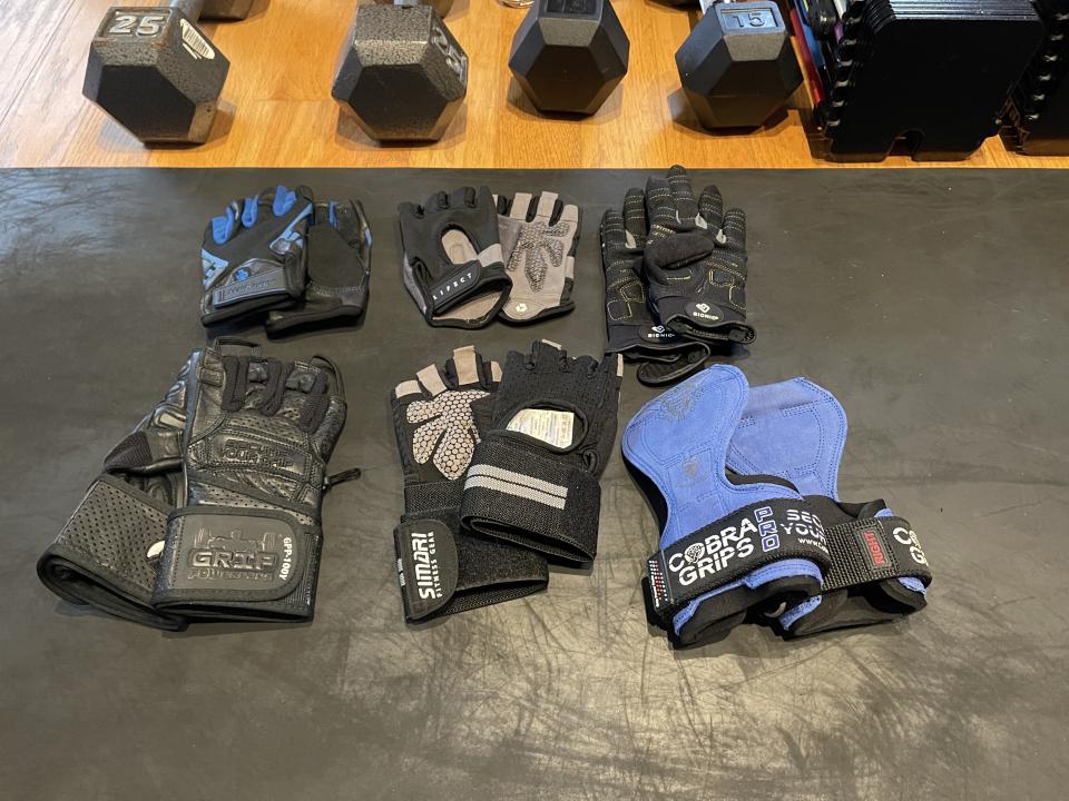 SPY Editor original shot of weightlifting gloves next to weights during testing