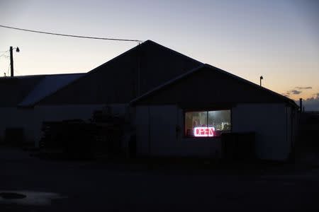 Martha's Kitchen is open as the sun rises over Saxis Island, a historic fishing village on Virginia's Eastern Shore October 25, 2013. REUTERS/Kevin Lamarque