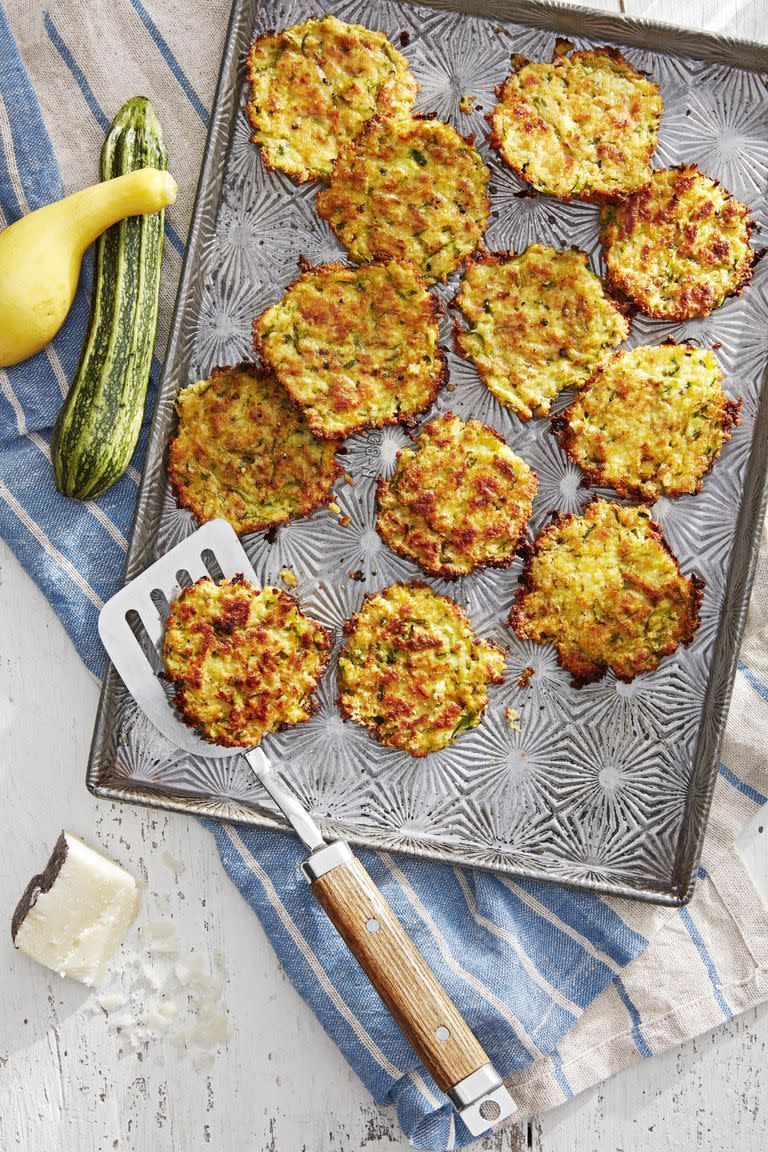 <p>Bake these crispy fritters in the oven and serve with your favorite dipping sauce.</p><p><strong><a href="https://www.countryliving.com/food-drinks/a28610429/zucchini-and-pecorino-fritters-recipe/" rel="nofollow noopener" target="_blank" data-ylk="slk:Get the recipe for Zucchini-and-Pecorino Fritters;elm:context_link;itc:0" class="link ">Get the recipe for Zucchini-and-Pecorino Fritters</a>.</strong> </p>