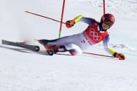 Mikaela Shiffrin of United States loses control and skis off course during the first run of the women's giant slalom at the 2022 Winter Olympics, Monday, Feb. 7, 2022, in the Yanqing district of Beijing. (AP Photo/Robert F. Bukaty)