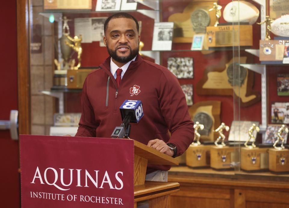 Maurice Jackson was introduced as the head football coach at Aquinas. Jackson becomes the first Black coach to run the team, according to Aquinas records that go back to 1930.
