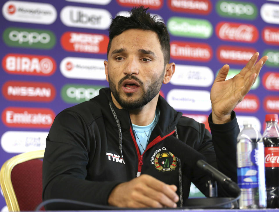 Afghanistan captain Gulbadin Naib speaks during a press conference at Old Trafford, Manchester, England, Monday June 17, 2019. (Nigel French/PA via AP)