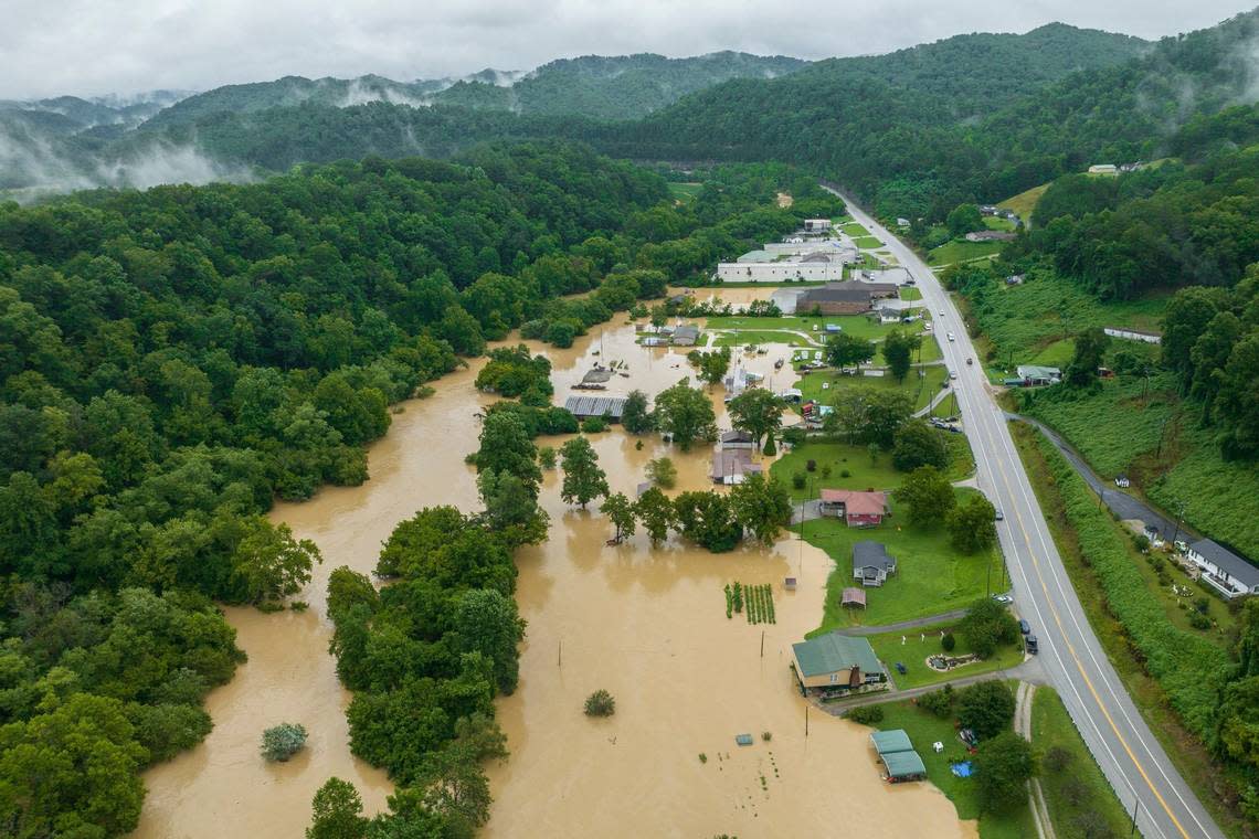 Home and structures are flooded near Quicksand, Ky., Thursday, July 28, 2022.