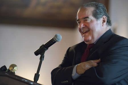 U.S. Supreme Court Justice Antonin Scalia speaks at an event sponsored by the Federalist Society in New York in this October 13, 2014 file photo. REUTERS/Darren Ornitz/Files