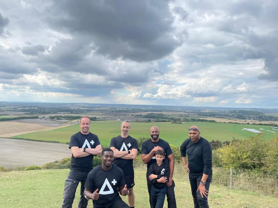 Hunted team members donning their Peak Aid t-shirts in order to take on the peaks (Jean-Pascal Barbe is the third person on the back row) (Jean-Pascal Barbe/PA)