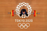 <p>TOKYO, JAPAN - JULY 25: Igor Son of Team kazakhstan competes during the Weightlifting - Men's 61kg Group A on day two of the Tokyo 2020 Olympic Games at Tokyo International Forum on July 25, 2021 in Tokyo, Japan. (Photo by Chris Graythen/Getty Images)</p> 