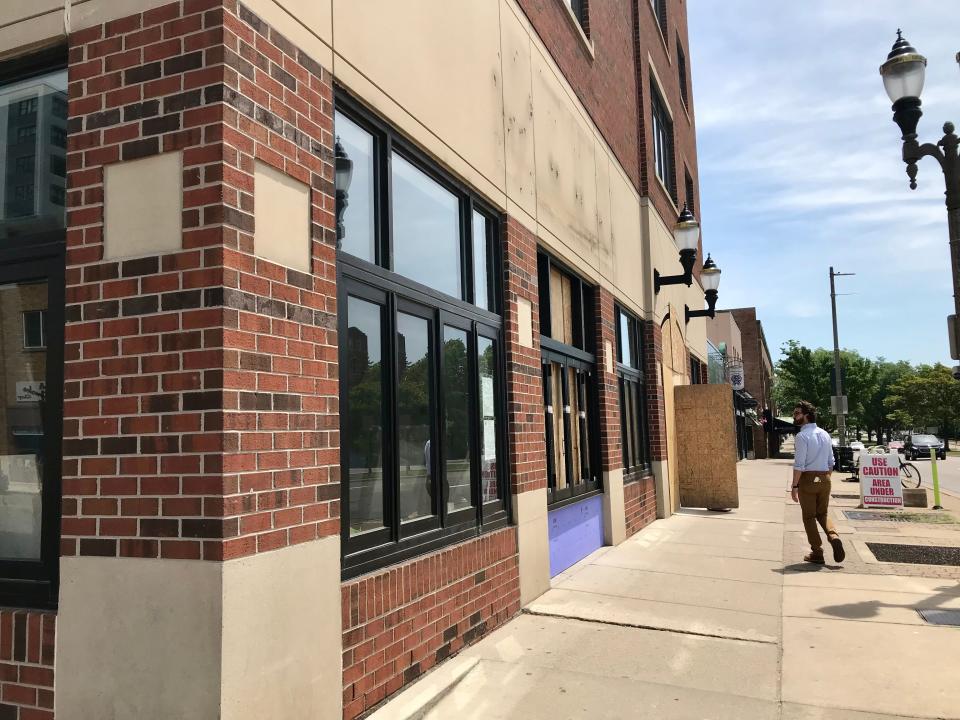 Construction is underway for Michigan's first Raising Cane’s Chicken Fingers restaurant in downtown East Lansing on June 13, 2022.