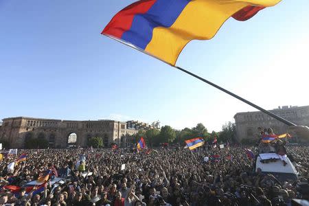 People celebrate after Armenian Prime Minister Serzh Sarksyan resigned following almost two weeks of mass street protests, in central Yerevan, Armenia April 23, 2018. REUTERS/Vahram Baghdasaryan/Photolure