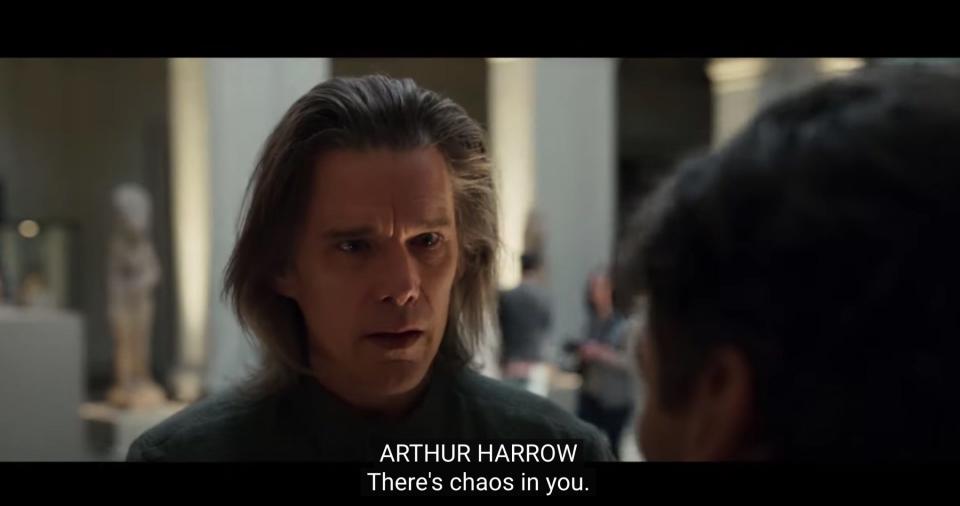 A still from the Moon Knight trailer shows Ethan Hawke as Arthur Harrow saying the phrase "There's chaos in you"