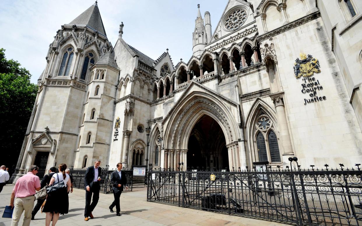 The Royal Courts of Justice in central London - PA