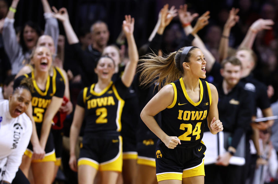 Iowa guard Gabbie Marshall (24) reacts after making a 3-point shot against Rutgers during the second half of an NCAA college basketball game, Friday, Jan. 5, 2024, in Piscataway, N.J. (AP Photo/Noah K. Murray)