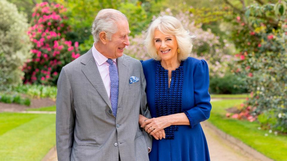 PHOTO: A handout photo issued by the Royal Household on April 26, 2024, shows Britain's King Charles III and Queen Camilla in the garden of Buckingham Palace in London, on April 10.  (Millie Pilkington/BUCKINGHAM PALACE/AFP via Getty )