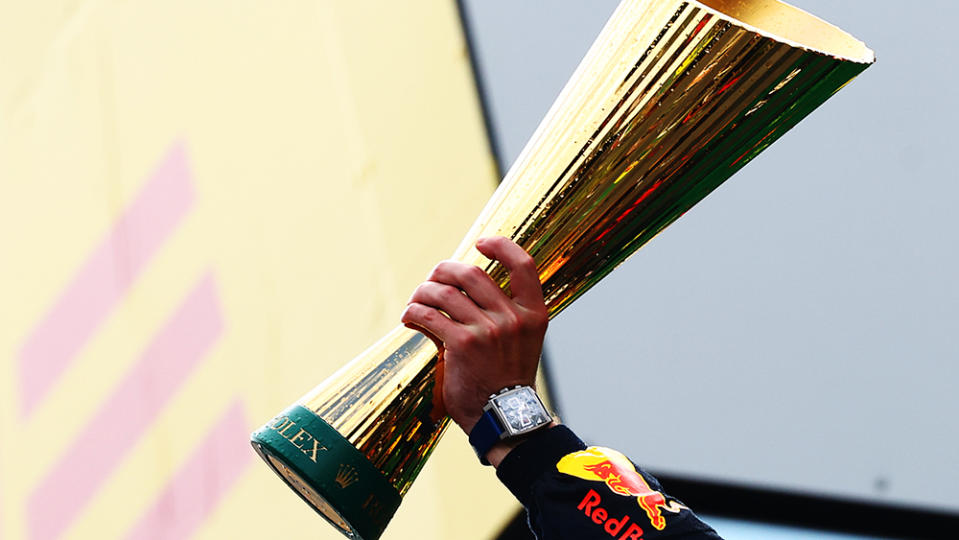 SPIELBERG, AUSTRIA - JULY 02: Race winner Max Verstappen of the Netherlands and Oracle Red Bull Racing holds his trophy on the podium during the F1 Grand Prix of Austria at Red Bull Ring on July 02, 2023 in Spielberg, Austria. (Photo by Mark Thompson/Getty Images)