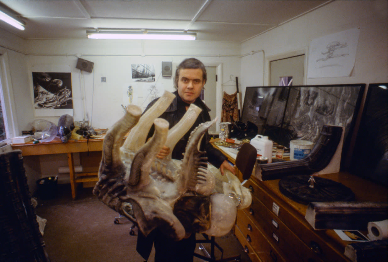 H.R. Giger poses with a prototype of his Xenomorph design for 'Alien.' The artist hoped to feature translucent version of the creature, but that version was abandoned before shooting began. (Courtesy of and ©2021 Museum HR Giger)