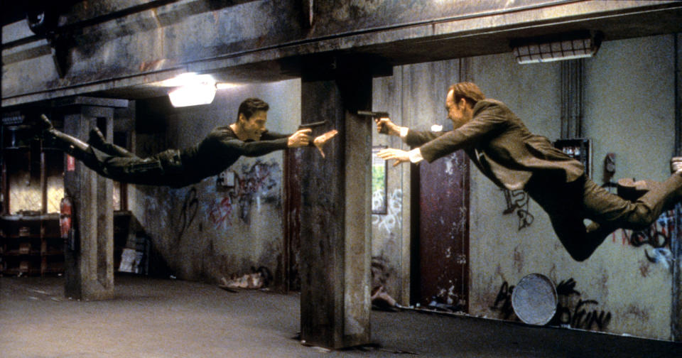 Keanu Reeves and Hugo Weaving in "The Matrix"