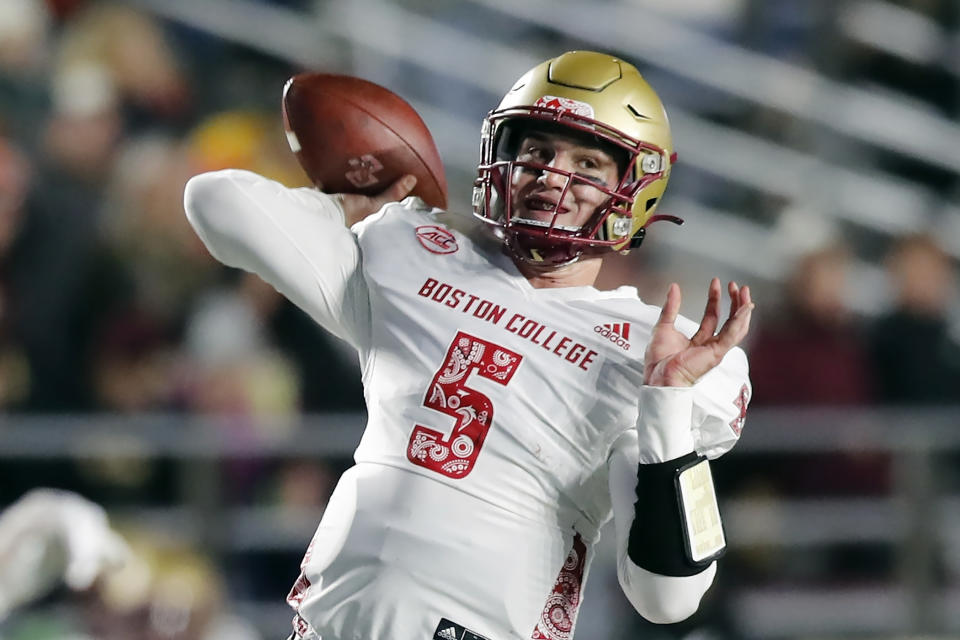 FILE - Boston College quarterback Phil Jurkovec (5) passes during the first half of an NCAA college football game against Virginia Tech on Nov. 5, 2021, in Boston. Boston College opens the 2022 season against Rutgers on Sept. 3.(AP Photo/Michael Dwyer, File)
