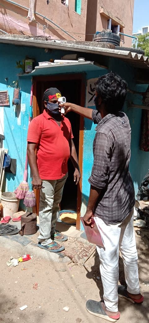 Mohammed Rashik, a surveyor, performs his daily task.