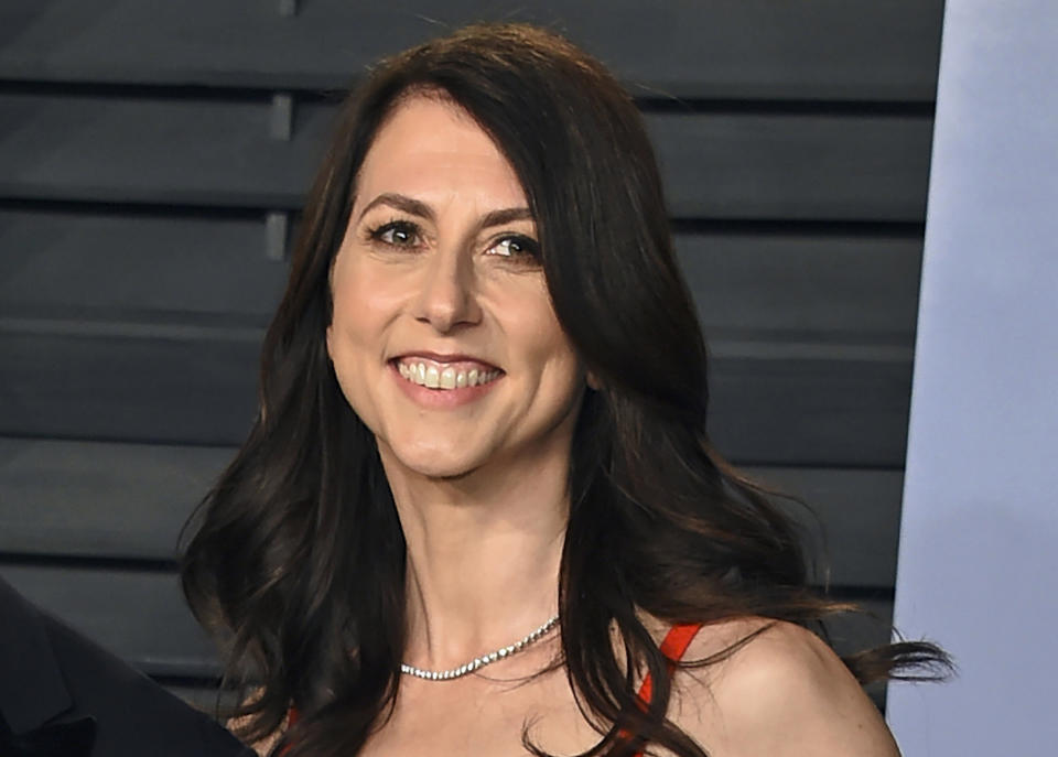 FILE - In this March 4, 2018, file photo, MacKenzie Bezos arrives at the Vanity Fair Oscar Party in Beverly Hills, Calif. Philanthropists Melinda French Gates, MacKenzie Scott and the family foundation of billionaire Lynn Schusterman awarded $40 million Thursday, July 29, 2021, to four gender equality projects. (Photo by Evan Agostini/Invision/AP, File)