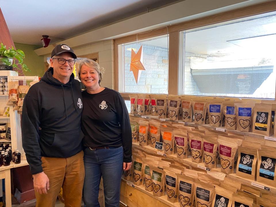 Christian and Carol Ash in their Kick Ash Door County store in Ellison Bay, where they sell artisan granola and gluten-free bakery they make and coffees they roast.
