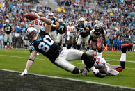 Jeremy Shockey #80 of the Carolina Panthers dives for a touchdown against Ahmad Black #43 of the Tampa Bay Buccaneers during their game at Bank of America Stadium on December 24, 2011 in Charlotte, North Carolina. (Photo by Streeter Lecka/Getty Images)