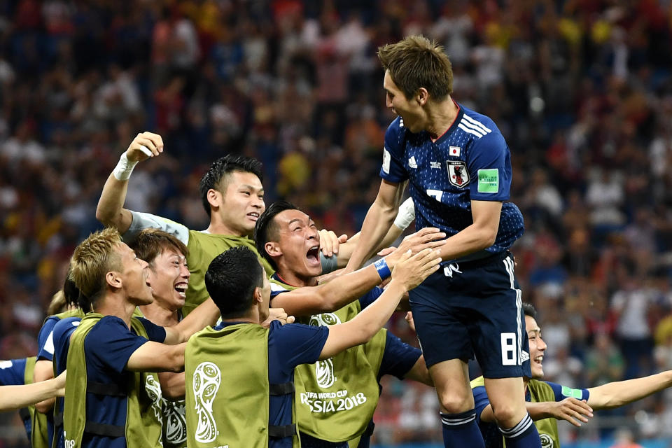 <p>Genki Haraguchi of Japan celebrates with teammates after scoring his team’s first goal during the 2018 FIFA World Cup Russia Round of 16 match between Belgium and Japan at Rostov Arena on July 2, 2018 in Rostov-on-Don, Russia. (Photo by Carl Court/Getty Images) </p>