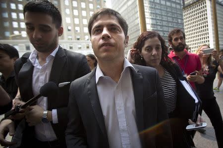Argentina's Economy Minister Axel Kicillof arrives at the office of a court-appointed mediator in New York July 30, 2014. Kicillof arrived on Wednesday at the office of a New York-based mediator in a last-minute bid to thrash out a deal with holdout investors whose legal action risks toppling the country into default. REUTERS/Carlo Allegri