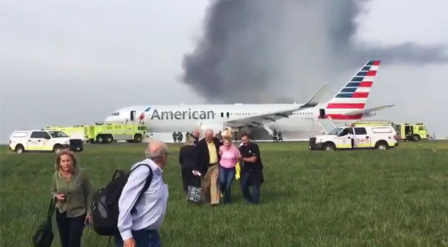 Dozens of passengers onboard an American Airlines flight at O'Hare Airport in 2016 grabbed their bags despite the plane bursting into flames. Source: AAP