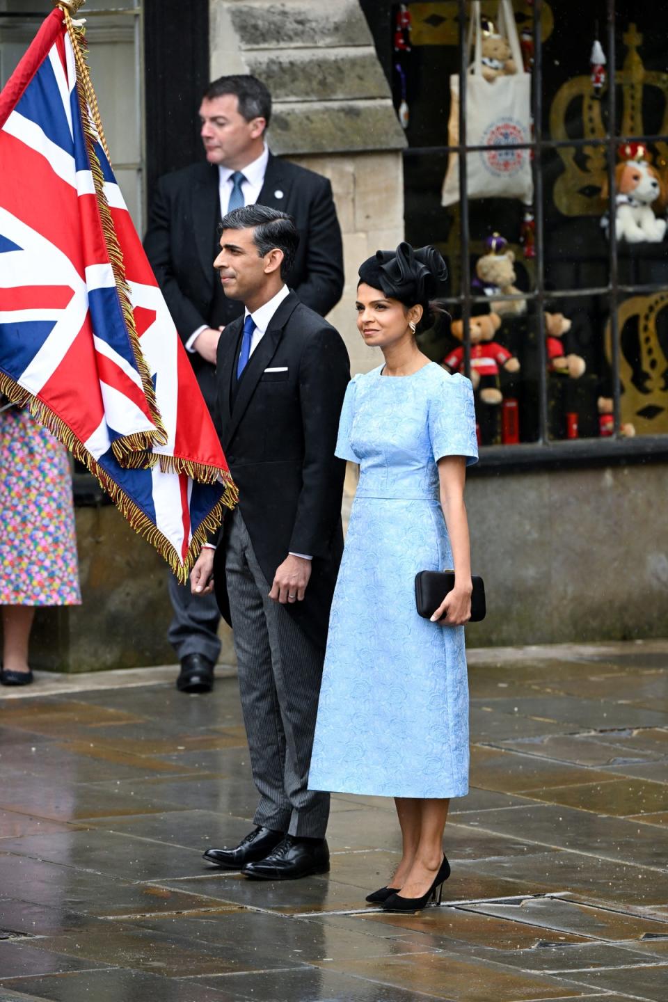 Rishi Sunak and Akshata Murty arrive at Westminster Abbey (REUTERS)