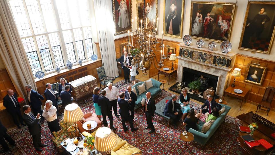 Members of the cabinet gather at Chequers, the Prime Minister’s official country residence (PA Images)