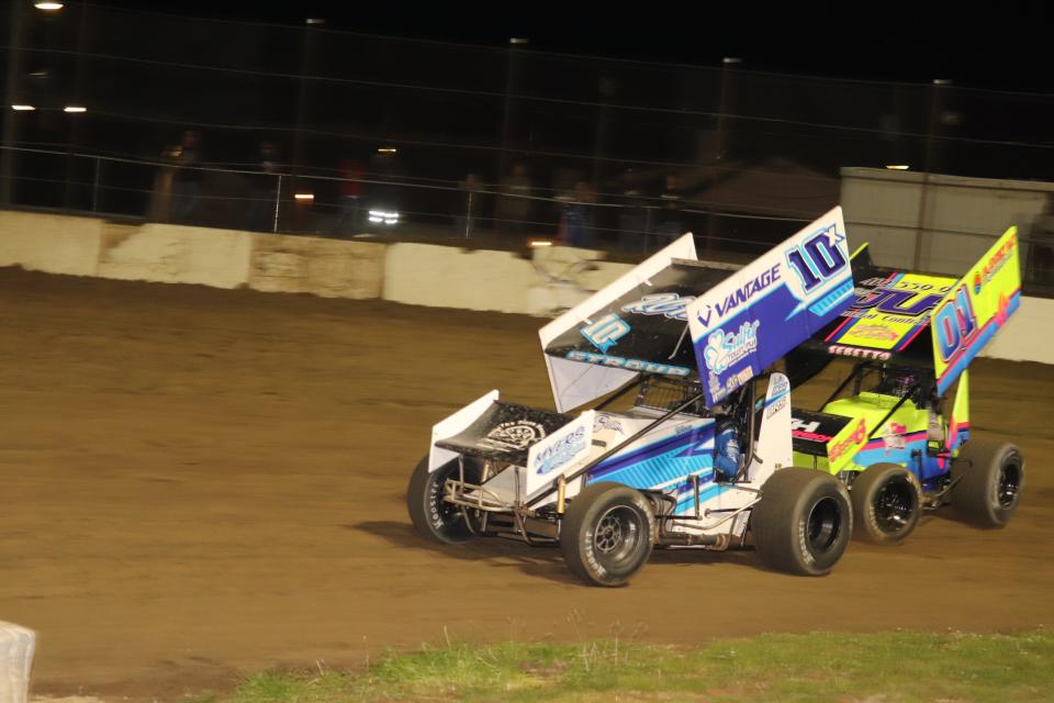 Dustin Stroup, left, battled Bryan Sebetto for the lead for several laps and won his ninth race at Fremont Speedway.