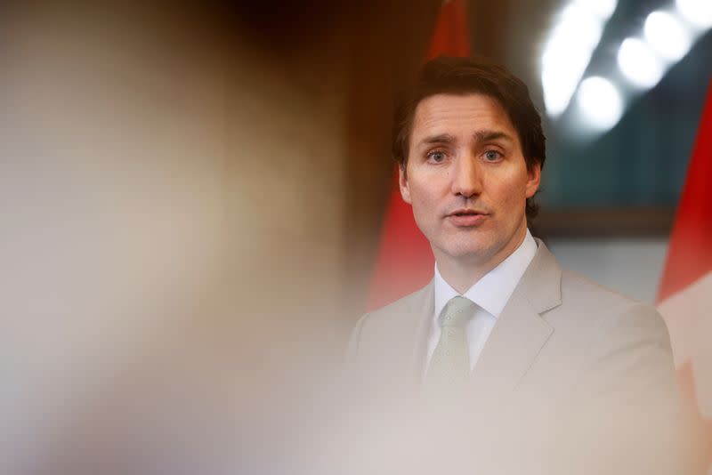 Canada's Prime Minister Justin Trudeau holds a press conference in response to the release of a special report on foreign interference, on Parliament Hill in Ottawa