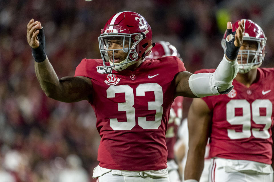 Alabama linebacker Anfernee Jennings (33) cheers the crowd against Arkansas during the first half of an NCAA college football game, Saturday, Oct. 26, 2019, in Tuscaloosa, Ala. (AP Photo/Vasha Hunt)