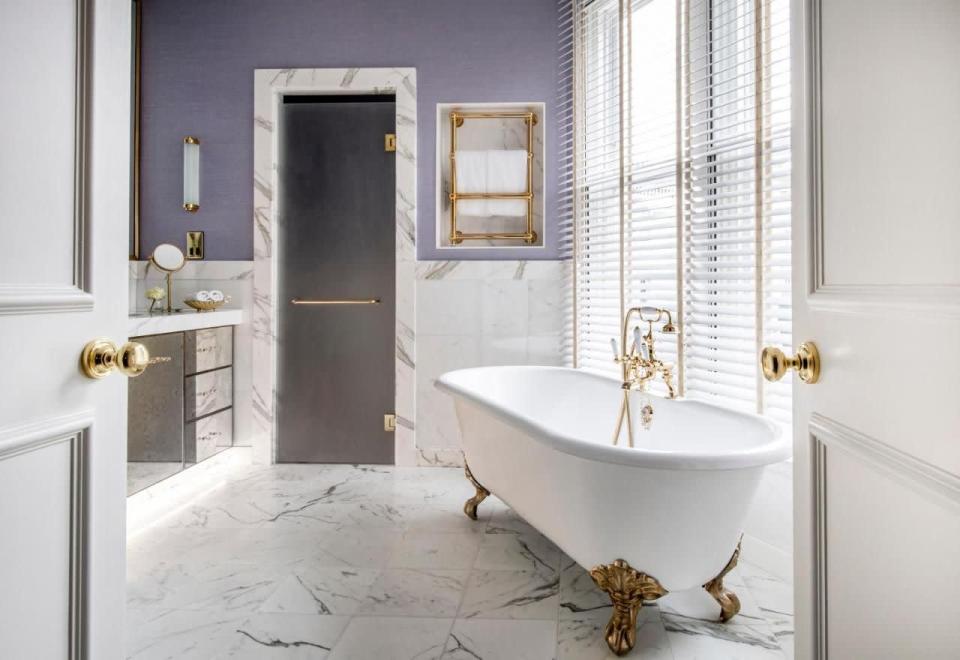 <p>The most romantic rooms at this townhouse hotel in Kensington are the ones with a freestanding bath tub, closely followed by those with a balcony. Unsurprisingly, it’s all very grand at <a href="https://www.booking.com/hotel/gb/the-kensington-london.en-gb.html?aid=2200764&label=romantic-hotels-london" rel="nofollow noopener" target="_blank" data-ylk="slk:The Kensington" class="link rapid-noclick-resp">The Kensington</a>, with its elegant white exterior and afternoon teas in the drawing room – the star of which are the playful nods to the location: Big Ben-shaped biscuits and red telephone box cakes. </p><p>Watch the bartenders at work from one of the midnight-blue velvet stools at the oak-panelled cocktail bar, or curl up by one of the fireplaces in the drawing room. If you're a couple who likes to shop together, the capital’s best department stores, including Harrods and Harvey Nicks, are just a 20-minute walk away.</p><p><a class="link rapid-noclick-resp" href="https://www.booking.com/hotel/gb/the-kensington-london.en-gb.html?aid=2200764&label=romantic-hotels-london" rel="nofollow noopener" target="_blank" data-ylk="slk:CHECK AVAILABILITY">CHECK AVAILABILITY</a></p>