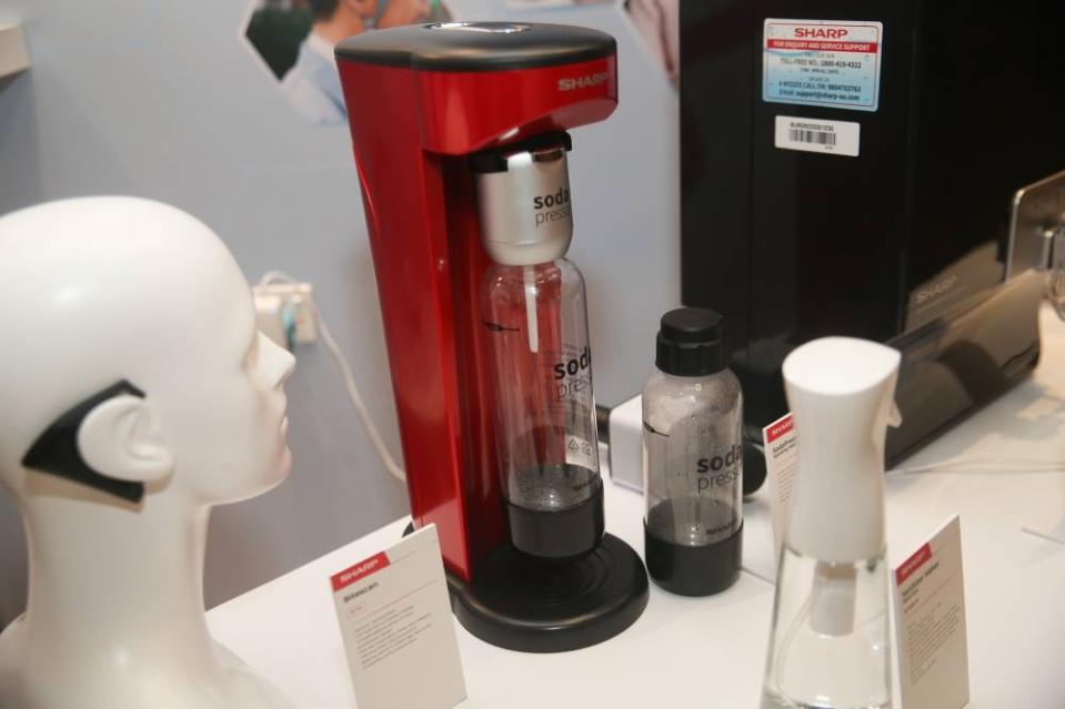 Some of Sharp's products that use advanced Japanese technology include their BiteScan device and the Medical Listening Plug. — Picture by Choo Choy May 