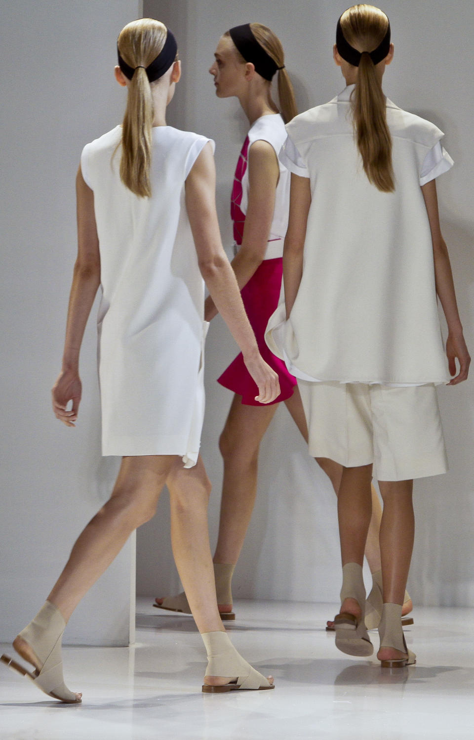 Fashion from the Victoria Beckham Spring 2014 collection is modeled on Sunday, Sept. 8, 2013 in New York. (AP Photo/Bebeto Matthews)