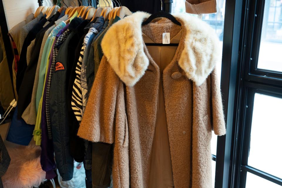 A vintage coat is shown as a gift item for holiday shoppers at the space for Flamingo Vintage in the Downtown Detroit Markets located at Cadillac Square in downtown Detroit on Wednesday, November 30, 2022.