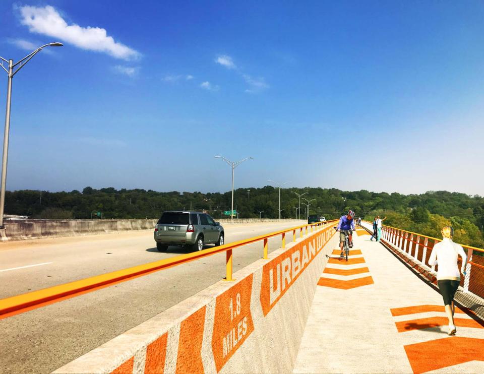 This rendering shows what bike and pedestrian paths could look like on the James White Parkway bridge as part of the Reconnecting Knoxville project, which was awarded $42.6 million from the federal government announced March 13. Adding new paths along the bridge won't come at the expense of vehicles, as all four traffic lanes will remain.