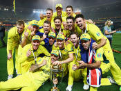 The Aussies congragate for a photo.