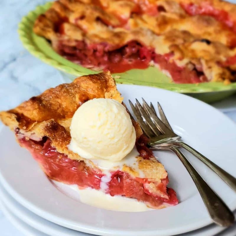 <p>Grits and Gouda</p><p>What's the shortcut? Refrigerated pie dough!</p><p><strong>Get the recipe: <a href="https://gritsandgouda.com/shortcut-strawberry-rhubarb-pie/?fbclid=IwAR0IzA-EIB7_aJZUSeFo1Hha9d-K-FeFZixaxBY5-1yFgIedE-inf9OQuVA" rel="nofollow noopener" target="_blank" data-ylk="slk:Shortcut Strawberry Rhubarb Pie;elm:context_link;itc:0;sec:content-canvas" class="link rapid-noclick-resp">Shortcut Strawberry Rhubarb Pie</a></strong></p>