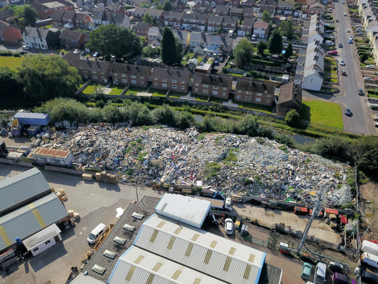 Aerial view of a mountain of rubbish in Willenhall, West Midlands. (SWNS)