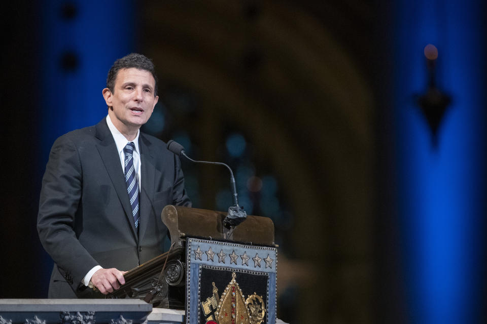 Journalist and writer David Remnick speaks during the Celebration of the Life of Toni Morrison, Thursday, Nov. 21, 2019, at the Cathedral of St. John the Divine in New York. Morrison, a Nobel laureate, died in August at 88. (AP Photo/Mary Altaffer)