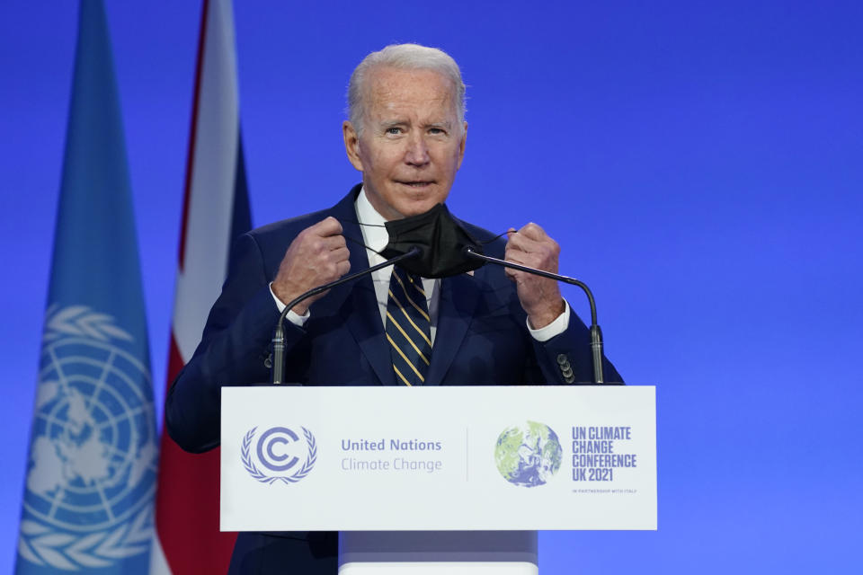 President Joe Biden steps to the podium to speak at the COP26 U.N. Climate Summit, Monday, Nov. 1, 2021, in Glasgow, Scotland. (AP Photo/Evan Vucci, Pool)