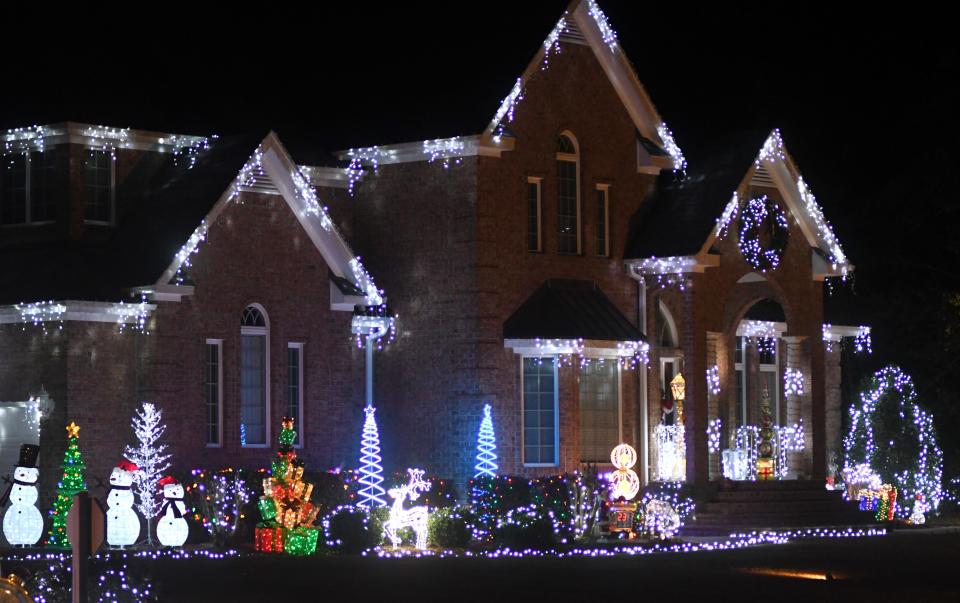 The home at 1305 Lovingston Lane is one of many in the neighborhood decorated for the holidays in Wilmington, N.C., December 1, 2021.   MATT BORN/STARNEWS