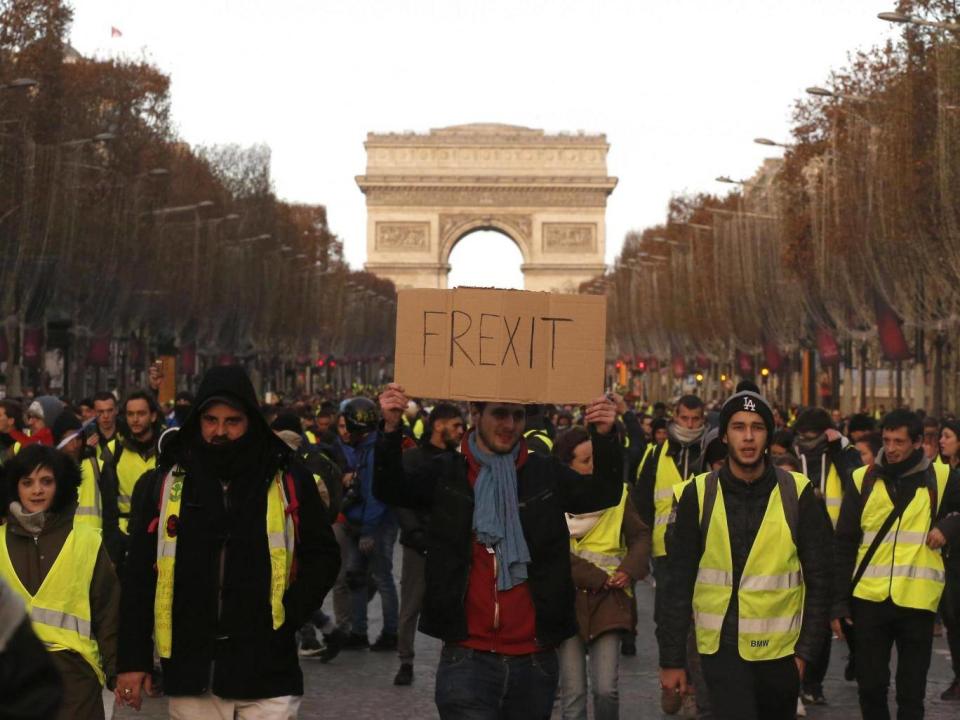 Protesters march in central Paris on Saturday (AP)