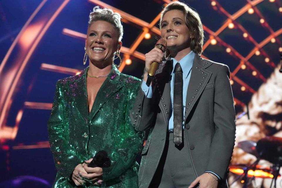 <p>Kevin Mazur/Getty </p> Pink and Brandi Carlile